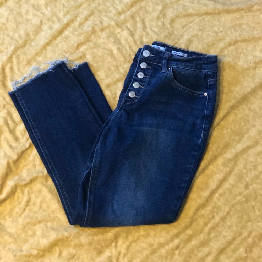 Woman size 8 high rise multi button cut off jeans